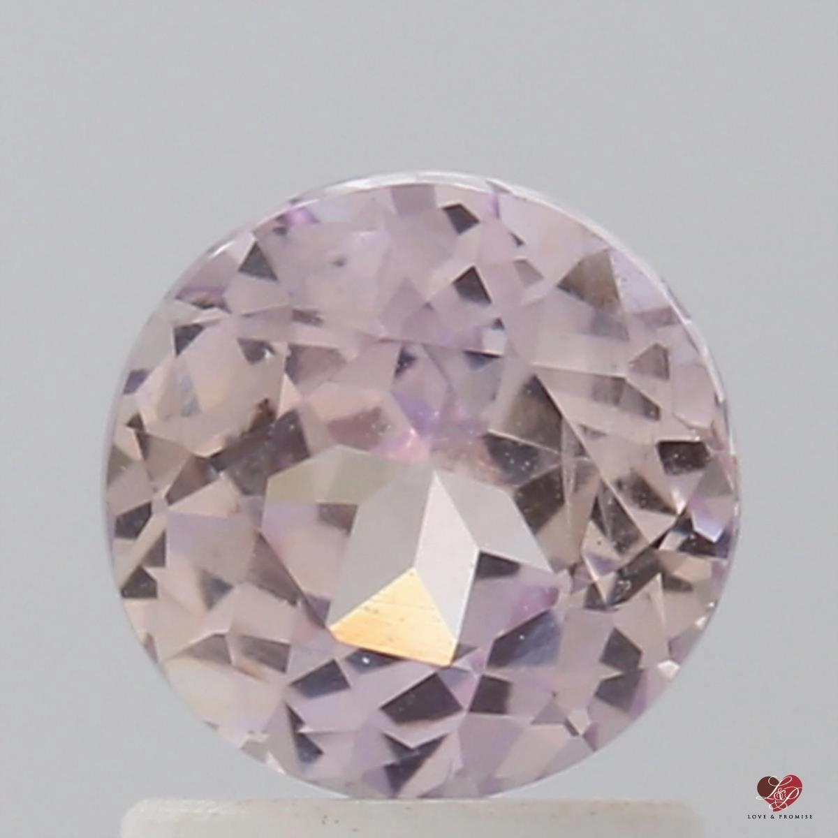 1.52cts Round Peachy Pink Champagne Sapphire