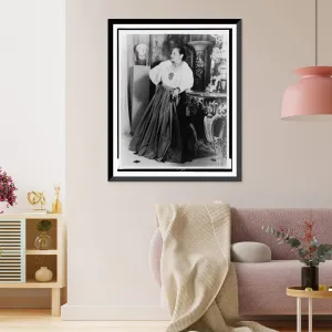 Historic Framed Print, [Helena Rubinstein, full-length portrait, standing, facing left, in the dining room of her New York City apartment], 17-7/8" x 21-7/8"