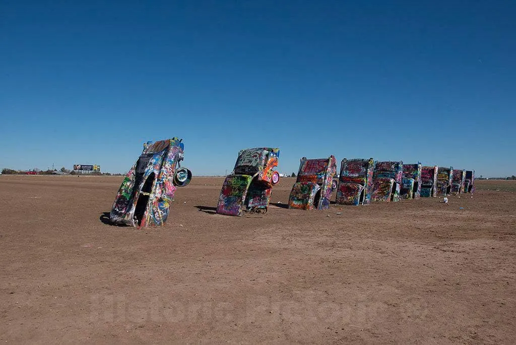 Historic Pictoric Photo- Robert Griffin is no Spray-Painting Vandal. Like Thousands of Other Visitors to The Cadillac Ranch Along Old U.S 3 Fine Art Photo Reproduction 24in x 16in