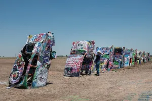 Historic Pictoric Photo- Robert Griffin is no Spray-Painting Vandal. Like Thousands of Other Visitors to The Cadillac Ranch Along Old U.S 4 Fine Art Photo Reproduction 24in x 16in